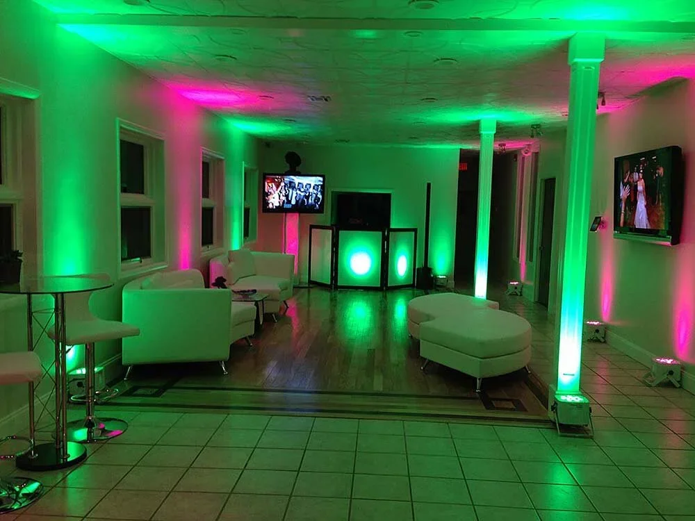 Reception room uplit in emerald