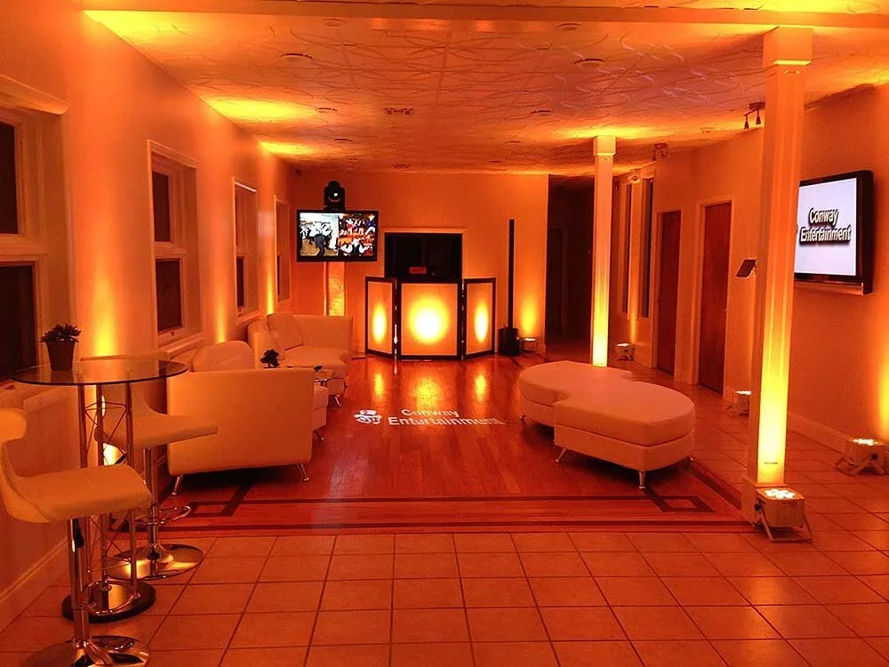 Reception room uplit in amber