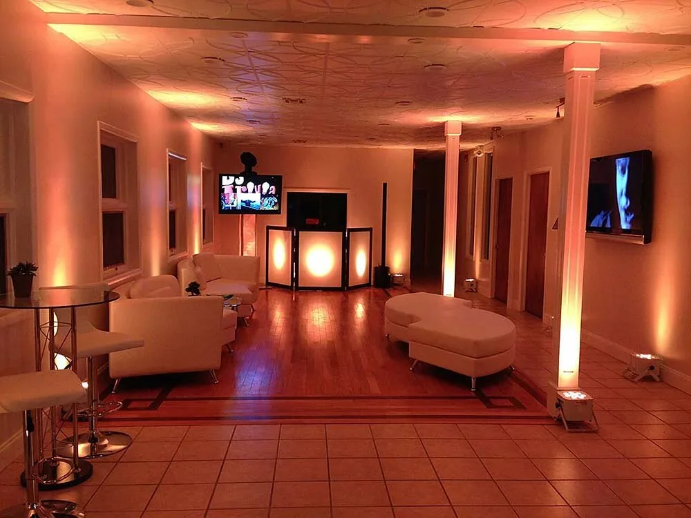 Reception room uplit in blush
